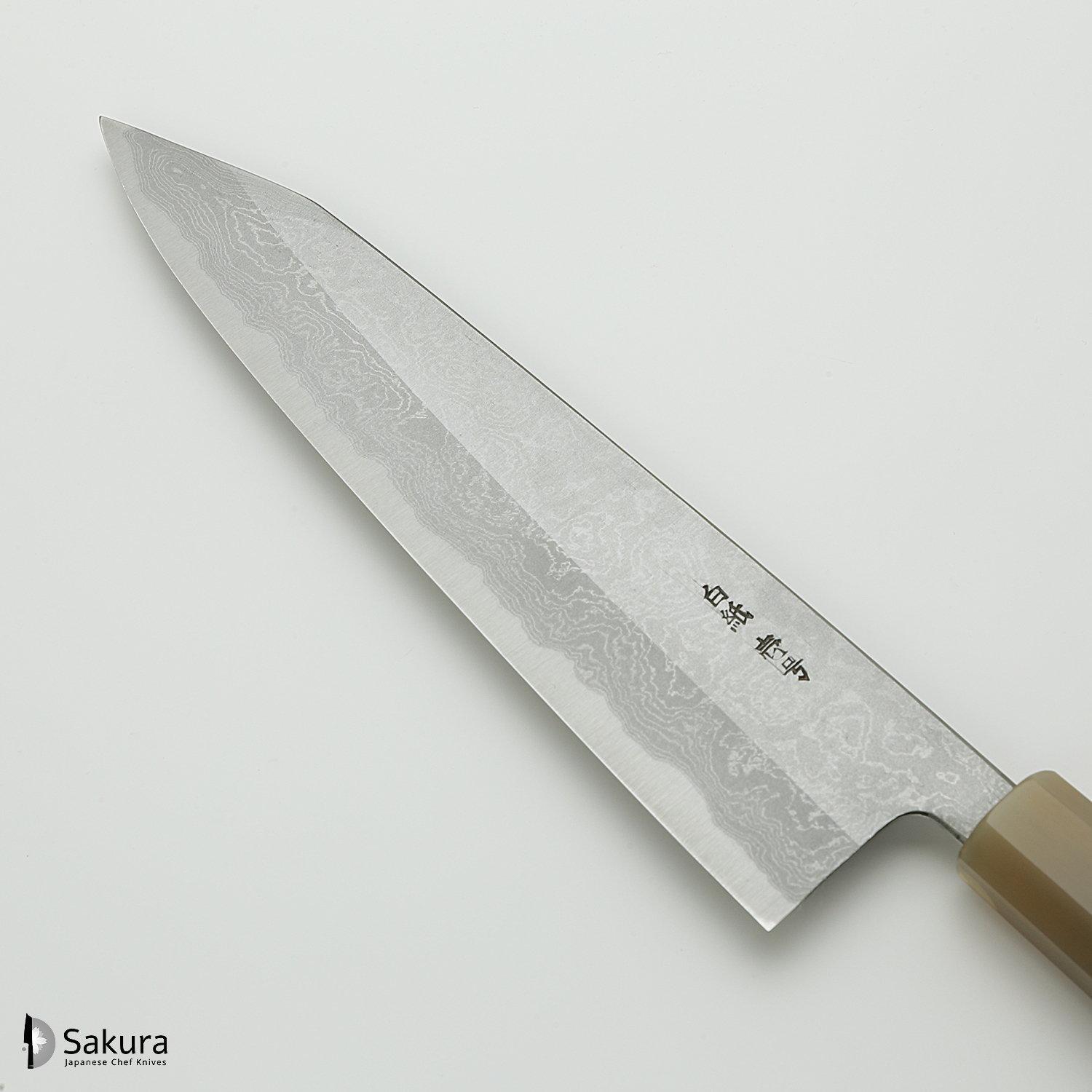 סכין שף רב-תכליתית קִּירִיצוּקֶה גִּיוּטוֹ 240מ״מ מחושלת בעבודת יד 3 שכבות: פלדת פחמן יפנית מתקדמת מסוג Shirogami #1 עטופה פלדת דמשק אל-חלד גימור דמשק יושיקאזו טאנקה יפן